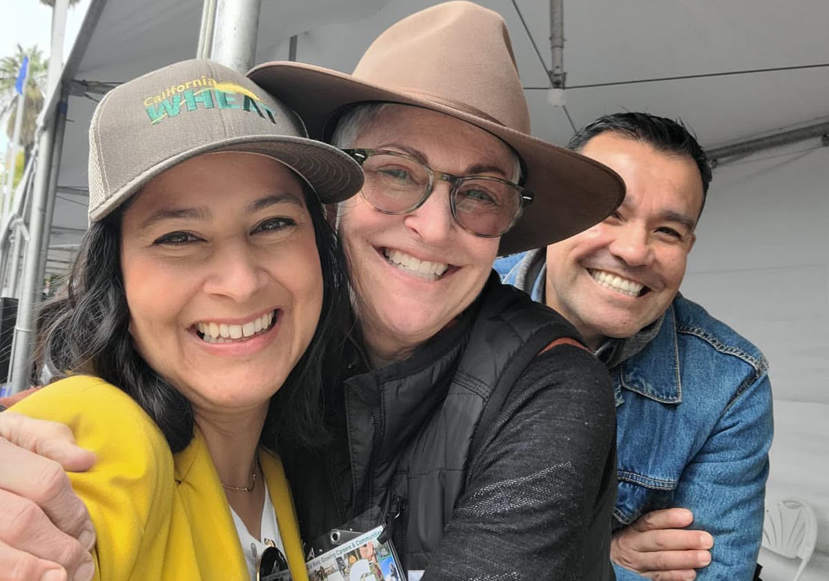 CA-Ag-Day Claudia Carter (CA Wheat Commission), Kathy Webster (TomKat Ranch), and José Corona (Office of Kat Taylor, APC) at Ag Day at the Capital in Sacramento, CA.