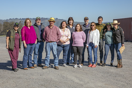 Founding members of Bar-C and other stakeholders pose with USDA Undersecretary, Jenny Lester Moffitt