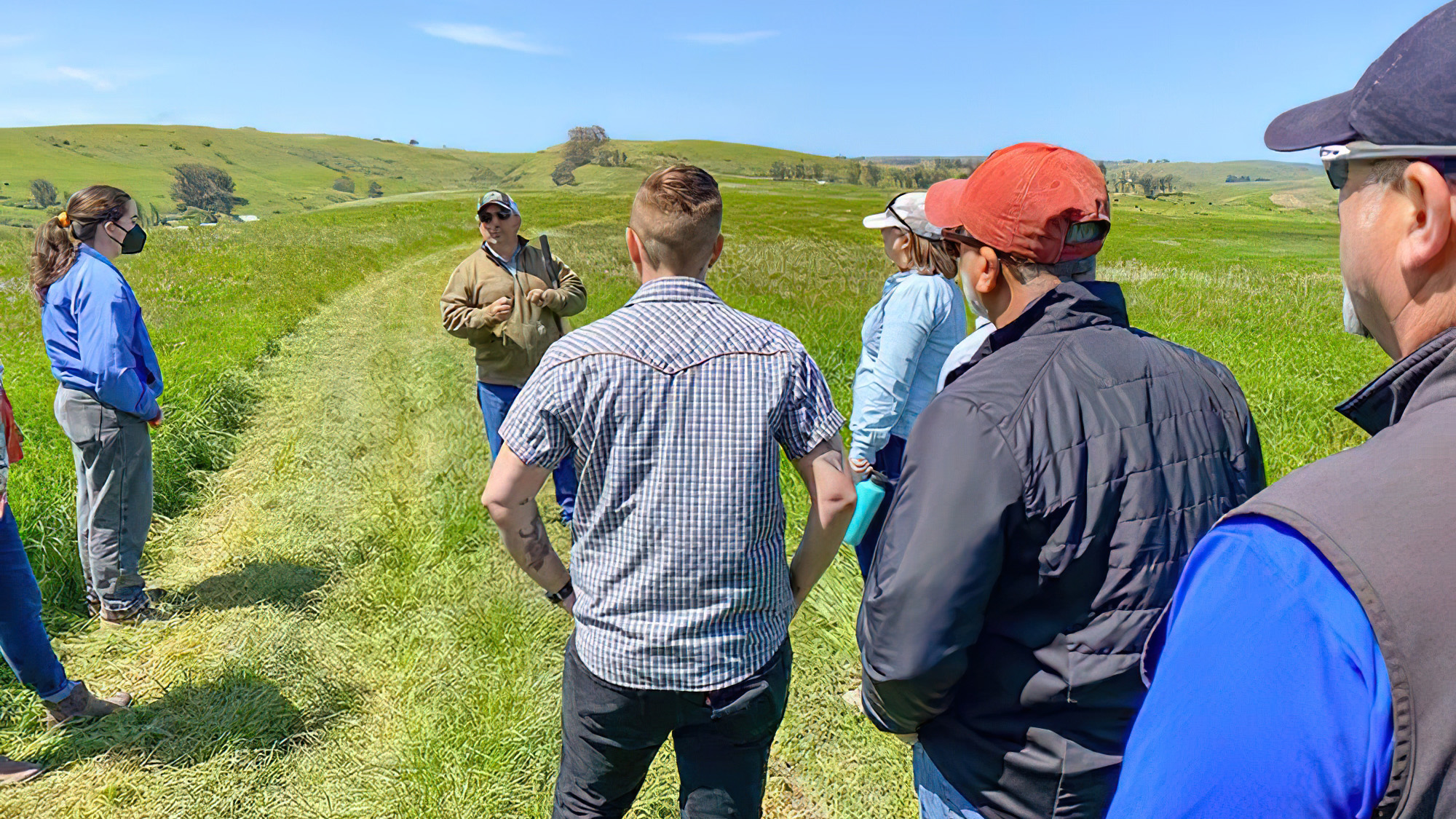 Loren Poncia of Stemple Creek Ranch in his pasture addressing attendees during the Beef2Institution event.