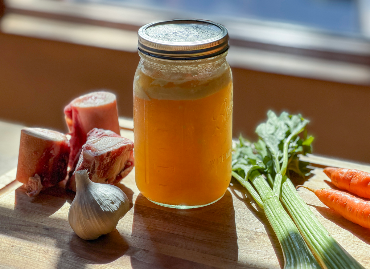 Beef bone broth in a jar. Photo by William Milliot